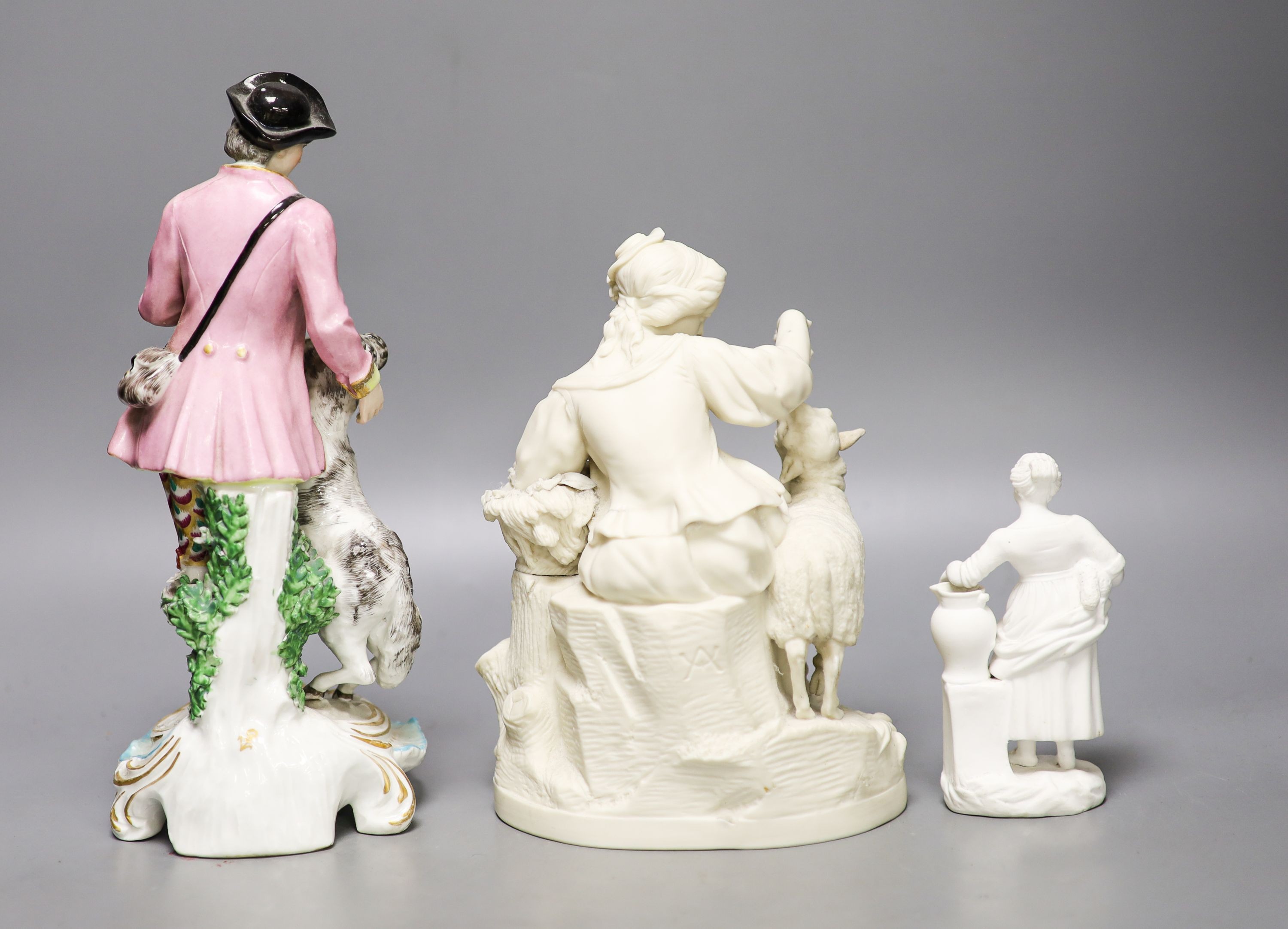 A Samuel Alcock parian group of a maid and sheep, a similar Minton biscuit group and a Samson porcelain group in Derby style Tallest 27cm